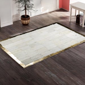White Goatskin Rug: Handmade Patchwork with Gold Border