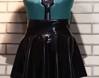 May include: A black patent leather mini skirt with a flared hem.
