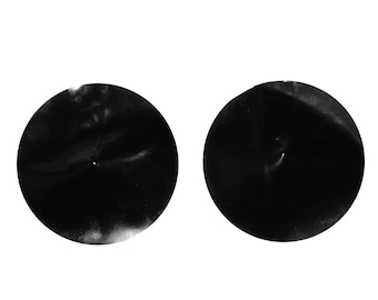 May include: Two black adhesive bandage covers, also known as booboos, are shown on a white background.