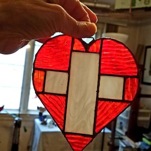Stained glass heart with cross Suncatcher