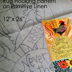 May include: A rug hooking pattern on primitive linen. The design includes a rooster, sun, and floral elements. The text reads "Never let the sunshine catch you sleeping." The dimensions are 12" x 26".