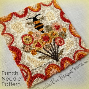 Puede incluir: Un patrón de aguja de punzón que presenta una abeja y flores en tonos de rojo, naranja, amarillo y marrón. El patrón está rodeado por un borde de ondas rojas, naranjas y amarillas. El texto "Copyright Michelle L.  "Humble Bee Bouquet" 2017 Michelle L." es visible en la esquina inferior derecha.