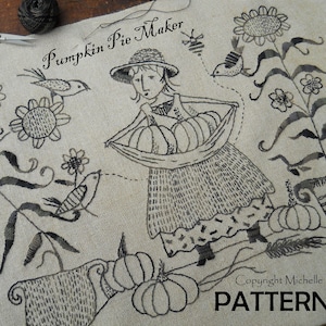 May include: Black and white embroidery pattern for a pumpkin pie maker with sunflowers, birds, and pumpkins. The pattern includes the text "Pumpkin Pie Maker" and "PATTERN".