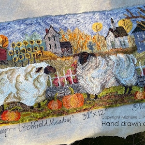 May include: A rug hooking pattern titled "Harvest Sheep - Litchfield Meadow" featuring a pastoral scene with sheep, pumpkins, and a farmhouse. The artwork measures 32" x 12" and is hand-drawn on primitive linen.