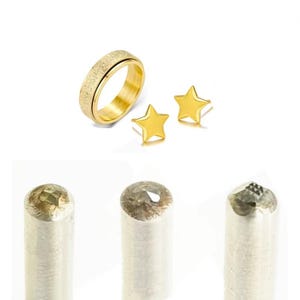 May include: A gold ring with a textured band and two gold star-shaped stud earrings. Below are three silver metal tools with textured tips, possibly for jewellery making or metal stamping.