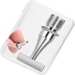 May include: A silver-colored bottle stopper with a threaded top and a rectangular base. The stopper is packaged in a clear plastic case. A small, silver-colored piece is held in a hand.