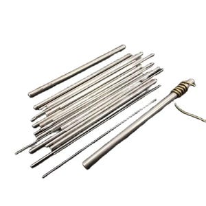 May include: A collection of silver-colored metal rods of varying lengths, some with rounded tips. One rod has a wrapped wire detail and a thin wire extending from it. The rods are arranged against a white background.