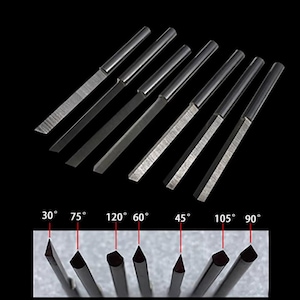 Pode incluir: Conjunto de 7 ferramentas de escultura em metal de cor prateada com diferentes pontas angulares. As pontas são etiquetadas com ângulos: 30°, 75°, 120°, 60°, 45°, 105° e 90°.