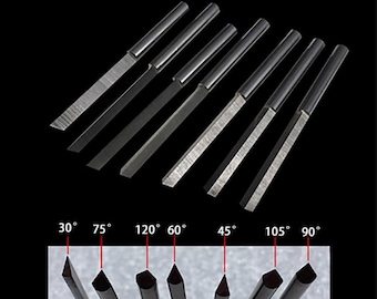 May include: Set of 7 silver-colored metal carving tools with different angled tips. The tips are labeled with angles: 30°, 75°, 120°, 60°, 45°, 105°, and 90°. 