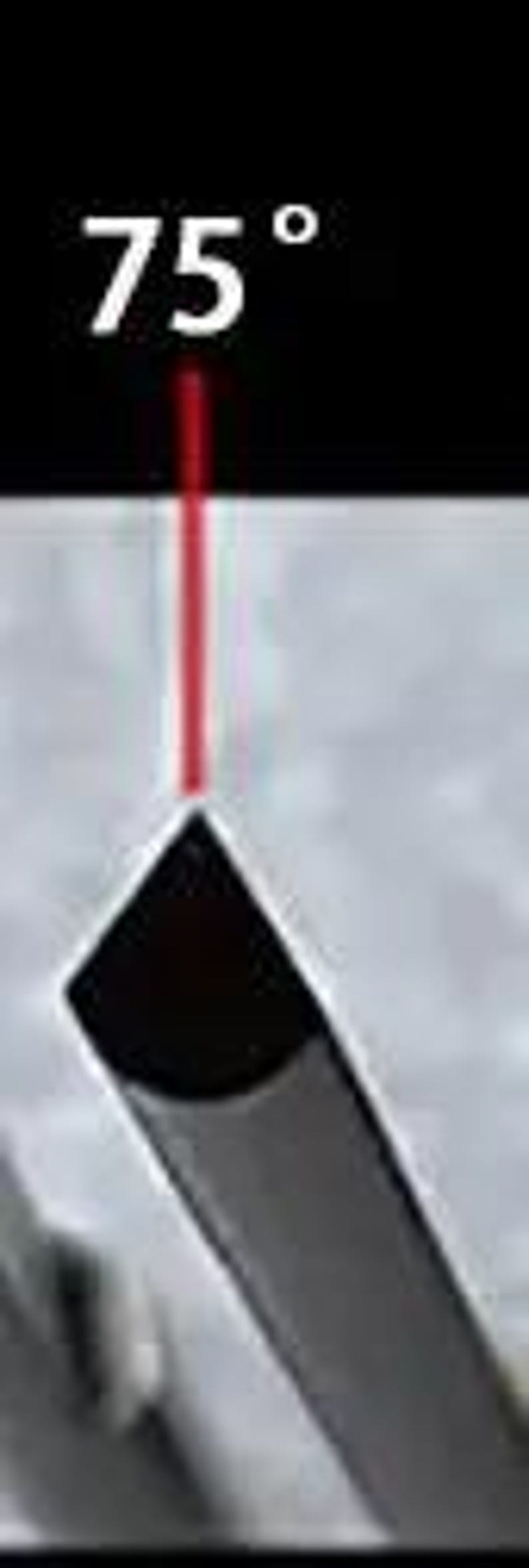 May include: A red laser beam pointing down at a 75 degree angle towards a black object.