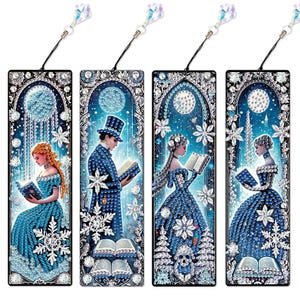May include: Four decorative bookmarks with illustrations of people reading in a winter scene. Each bookmark has a unique design with a blue and white colour scheme, embellished with crystals and a dangling crystal charm.