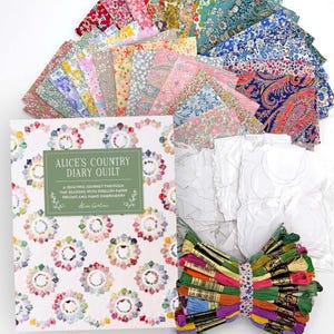 May include: A quilting kit with a book titled "Alice's Country Diary Quilt", floral fabric bundles, embroidery floss, and paper templates. The book cover has a floral design and the text "A Quilting Journey Through The Seasons With English Paper Piecing And Hand Embroidery."
