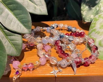 Bracciale con ciondoli di perline di cristallo ispirati all'amore e allo spazio profondo - Gamecore Jewelry
