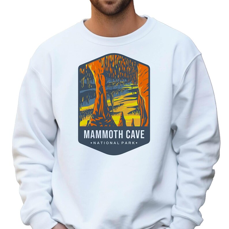 Unisex Mammoth Cave National Park sweatshirt featuring a relaxed fit, ribbed cuffs, and OEKO-TEX certified dyes. Made from durable, soft fabric with a fleece interior. Colors: Pepper, Terracotta, Butter, White, Blue Spruce, Blue Jean, and True Navy.