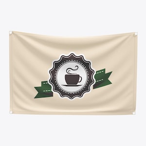 May include: A beige tapestry with a coffee-themed design. The central element is a circular emblem featuring a coffee cup with steam rising, surrounded by a decorative border. Green ribbons extend from the emblem, creating a banner effect.