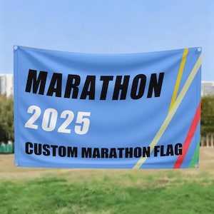 May include: A light blue custom marathon flag with the word "MARATHON" in large black letters, the year "2025" in white, and "CUSTOM MARATHON FLAG" in black. The flag has yellow, green, and red stripes.