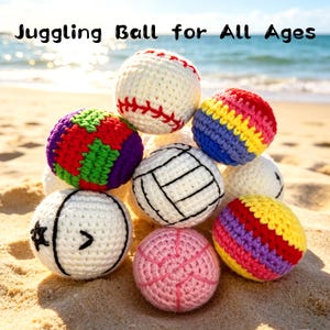 May include: A collection of handmade juggling balls in various designs, including a baseball, volleyball, and striped patterns. The balls are made of yarn and are arranged on a sandy beach with the text "Juggling Ball for All Ages".