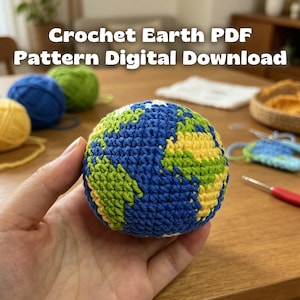 May include: A spherical crochet earth model featuring blue, green, and yellow yarn stitches to represent oceans and continents. The text Crochet Earth PDF Pattern Digital Download is displayed above the object, which is surrounded by yarn balls.