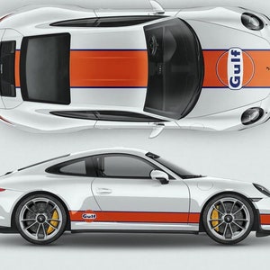 May include: A white Porsche 911 with orange and blue racing stripes and a Gulf Oil logo on the side. The car is shown from both the top and side views.