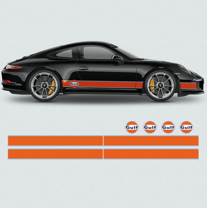 May include: Black Porsche with two orange racing stripes and the word "Gulf" on the side. The car is on a white background. There are four Gulf logos below the car.