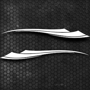 May include: Two white vinyl decals featuring a sharp, elongated, and tapered tribal-inspired graphic design. Each decal consists of layered, pointed segments that curve gracefully, creating a sleek and aerodynamic appearance for vehicle application.