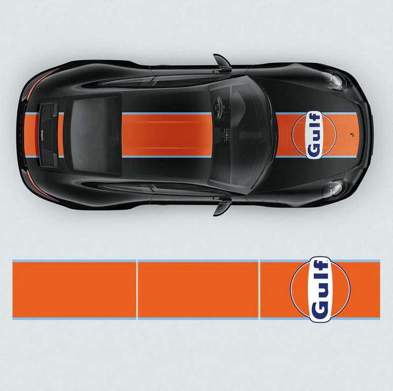 May include: A black car with a blue and orange racing stripe and a Gulf logo on the back. The car is on a white background.