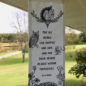 Small Prayer Flag banner with parrot feather and beads, Sutta Nipata