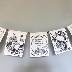 Prayer Flags with Buddha quote, wildlife drawings and wood beads, handmade string of 5 black and white flags