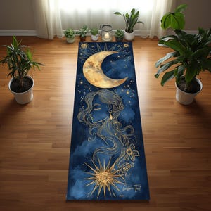 May include: A blue yoga mat with a gold crescent moon, stars, and a woman's face with flowing hair. The mat also features a gold sun with rays. The text "Christine Poet" is printed in gold at the bottom of the mat.