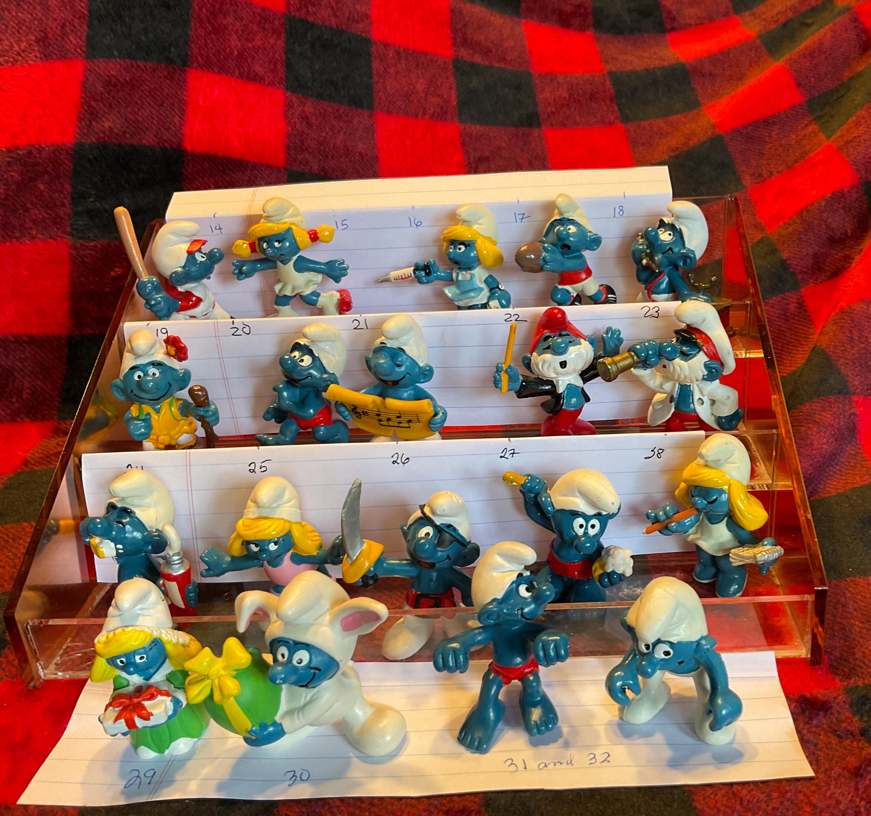Lot les SCHTROUMPFS 20096 20094 MASSUE et LIVRE SCHLEICH