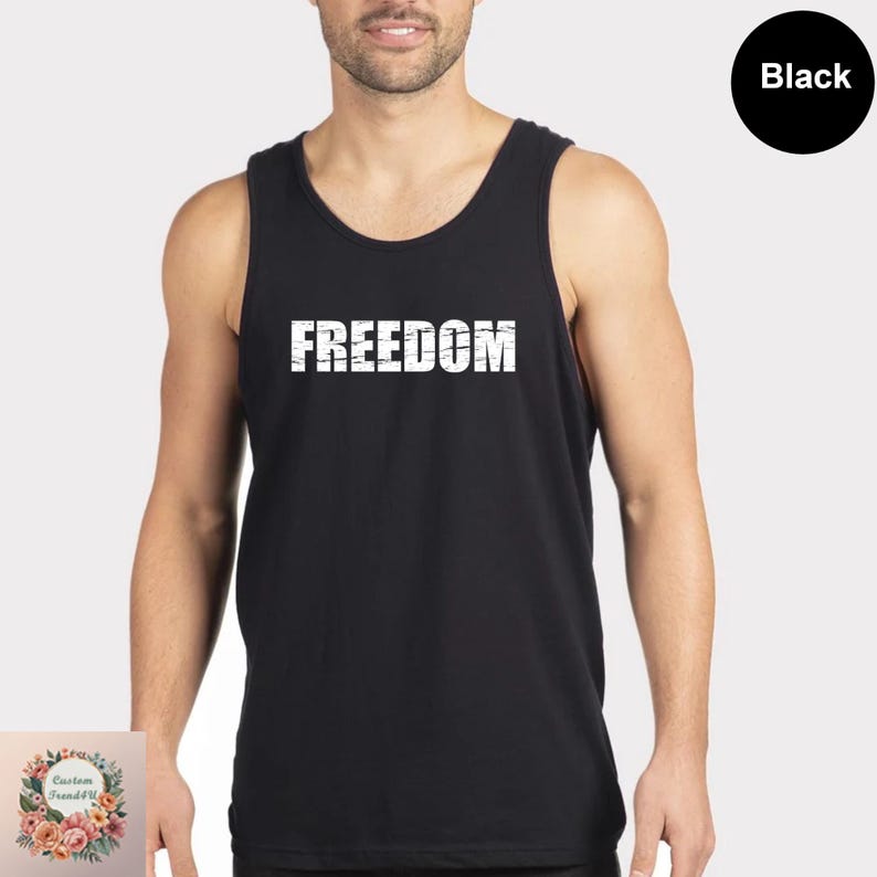 A man wearing a black tank top with the word "FREEDOM" printed on it.