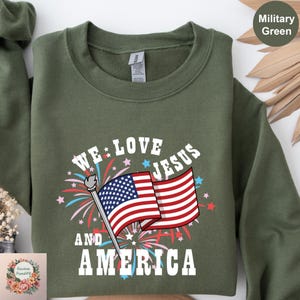 We Love Jesus And America Sweatshirt: Christian 4th of July Hoodie