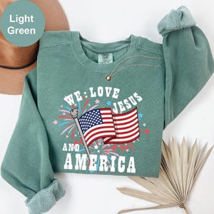 Comfort Colors We Love Jesus & America Sweatshirt: Patriotic USA