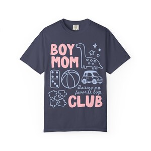 Denim Comfort Colors boy mom club shirt with playful dinosaur puzzle toy illustrations raising my favorite boys slogan vintage style motherhood graphic tee relaxed fit mom of sons gift ships without price tag
