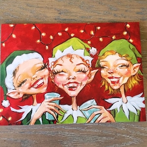 Tarjeta de felicitación navideña "3 elfos felices" de Lori Gutiérrez