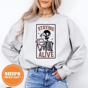 Staying Alive Skeleton Coffee Sweatshirt, Funny Hoodie for Women, Retro Skull Pullover, Halloween Coffee Lover Gift, Cozy Graphic Hoodie