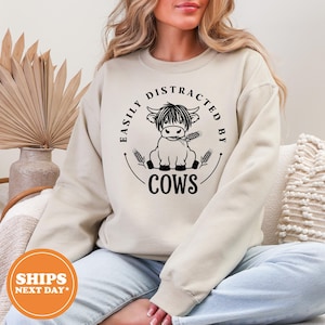 Easily Distracted by Cows Hoodie, Funny Cow Lover Sweatshirt, Farm Animal Gift, Cozy Farm Life Hoodie, Cow Themed Pullover for Women & Men