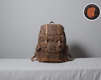 Washed Waterproof Canvas Backpack | Spacious Traveling Rucksack | Retro Style Bag with Functional Pockets | Ideal Tote for Men & Women