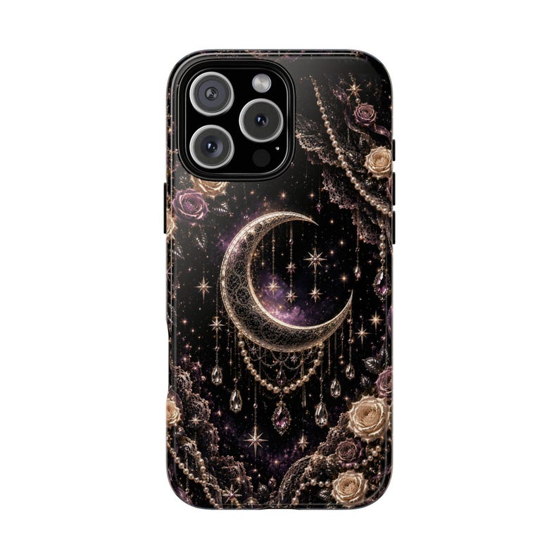 May include: Black phone case featuring a crescent moon design with stars, pearls, and roses. The case has a glossy finish and a dark, celestial theme. The camera lenses are visible at the top.