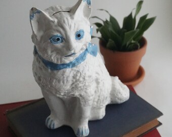 Vintage chalkware cat coin bank, farmhouse decor, large ceramic statue, nursery decor, white cat with blue bow, vintage baby shower