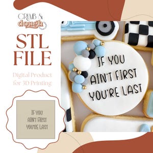 May include: An image featuring a digital product for 3D printing. The design includes a cookie with the text "IF YOU AIN'T FIRST YOU'RE LAST" and decorative elements. The image also displays the text "STL FILE" and "Digital Product for 3D Printing".
