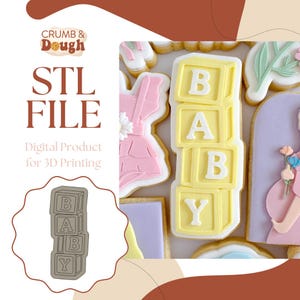 May include: Decorated sugar cookies, featuring a stack of yellow blocks spelling "BABY". Other cookies are shaped like a pink dress and a pregnant person. The image also includes the text "STL FILE" and "Digital Product for 3D Printing".