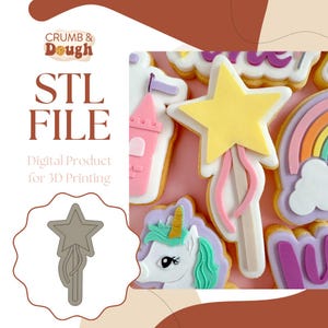 Op de afbeelding: Afbeelding van versierde koekjes, waaronder een ster-vormige toverstaf met een gele ster en roze linten. De tekst "STL FILE" en "Digital Product for 3D Printing" is ook zichtbaar.