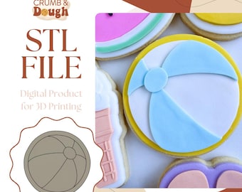 May include: A digital download STL file for a 3D printed cookie cutter shaped like a beach ball. The image shows a decorated cookie with a blue and white beach ball design.