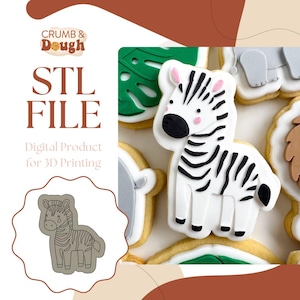 Op de afbeelding: Een digitaal STL-bestand voor 3D-printen van een zebra koekjesvormpje. De afbeelding toont een witte koek die is versierd met zwarte strepen en roze accenten, samen met een lijntekening van het koekjesvormpje.