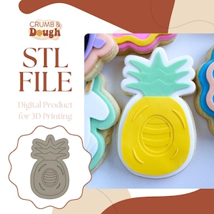 May include: A digital STL file for 3D printing a pineapple cookie cutter. The image shows a gray outline of the cutter and a decorated pineapple cookie.