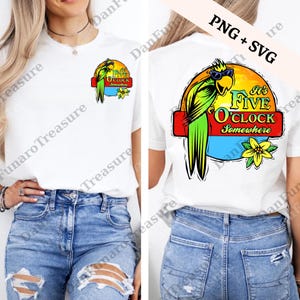 May include: White t-shirt featuring a colorful parrot design with the text "It's Five O'Clock Somewhere." The design includes a parrot wearing sunglasses, a sunset background, and a yellow flower. The shirt is made of a soft material.