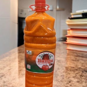 Pure Nigeriaanse rode palmolie – biologisch, ongeraffineerd, koudgeperst voor authentiek Afrikaans en Caribisch koken