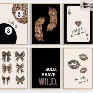 May include: Set of six framed art prints with a neutral color palette. Designs include a pool ball, leopard print, playing card, bows, text that reads "BOLD. BRAVE. WILD.", and leopard print lips. The text "Bonus set of prints included" is also visible.