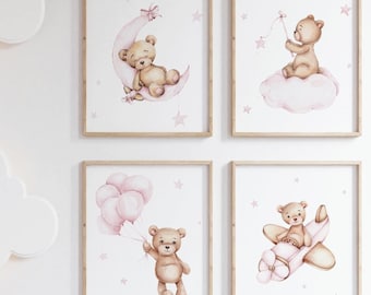 May include: Four framed prints featuring watercolour illustrations of a teddy bear in different scenes. The prints have a pink and brown colour scheme and feature stars and clouds.